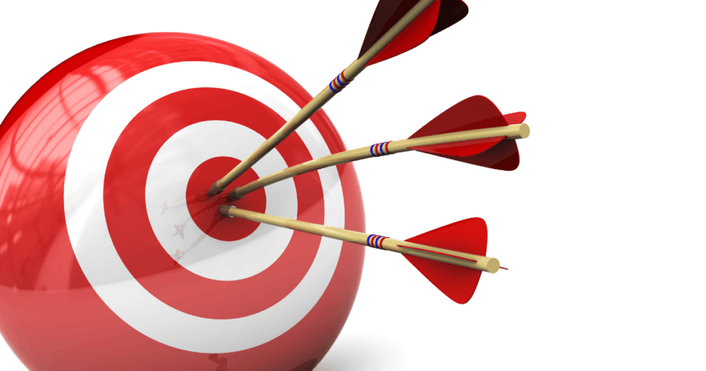 A target with arrows in the bullseye to signify finding your true target audience. 