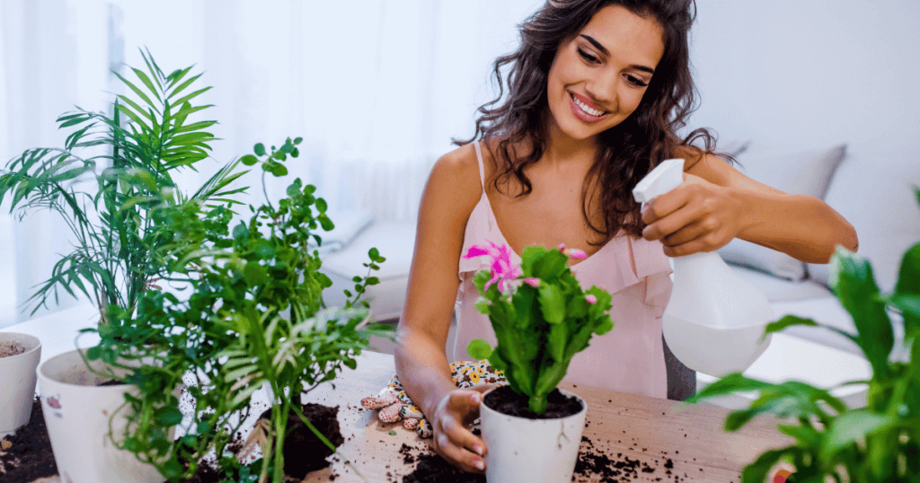 A woman enjoying her plant hobby. 