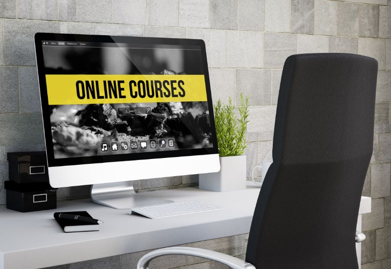 A desktop computer with Online Courses on it. 