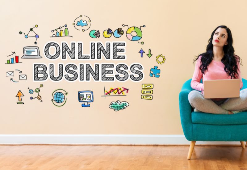 How to start an online business. A woman sitting in a chair thinking about the different online business types.