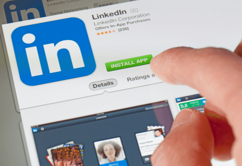Installing the LinkedIn app on an iPhone.